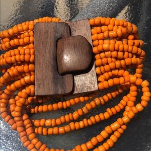 Orange and wood boho bracelet